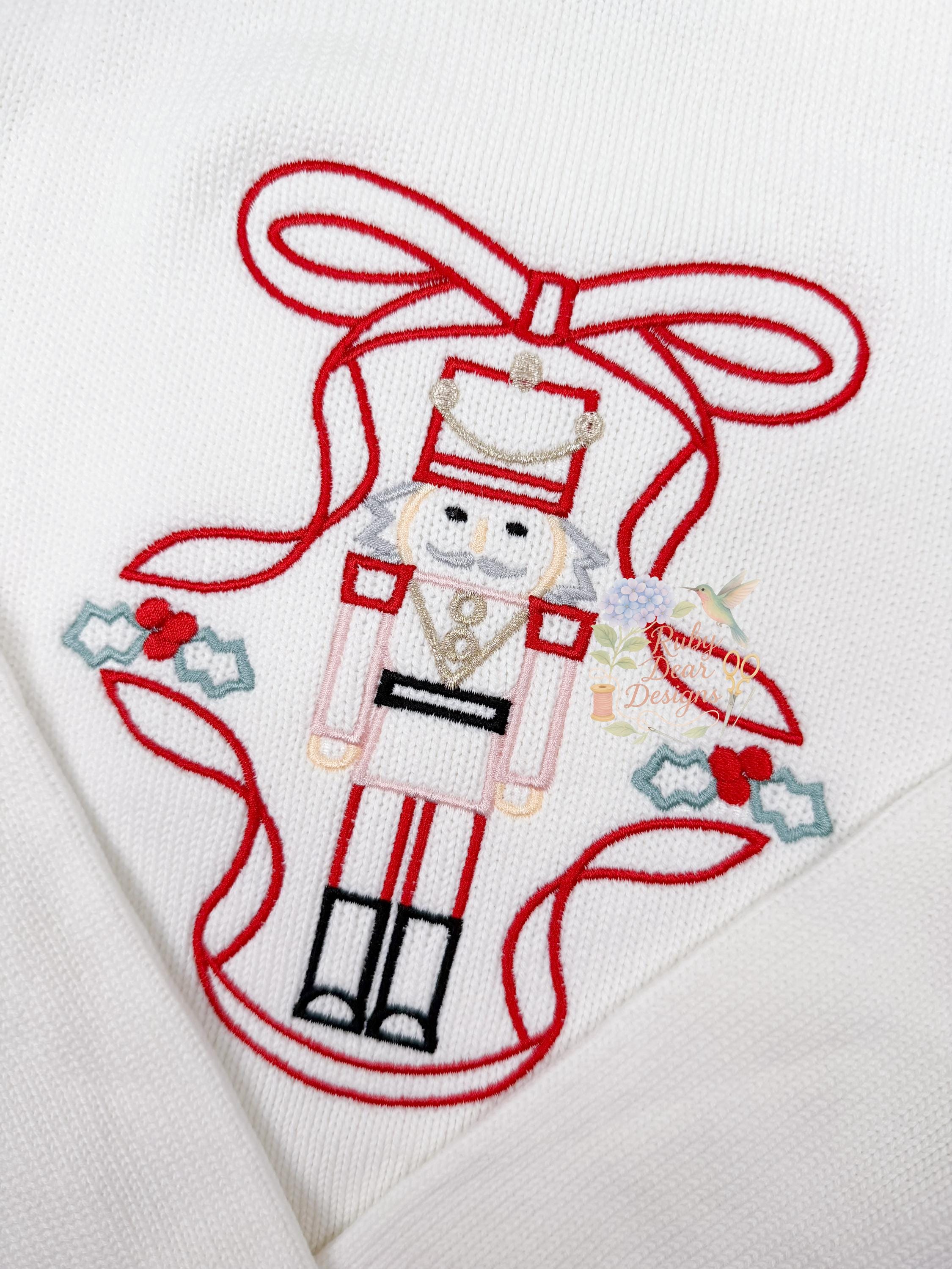 Nutcracker and Bow Frame Satin Outline Stitch Machine Embroidery Design