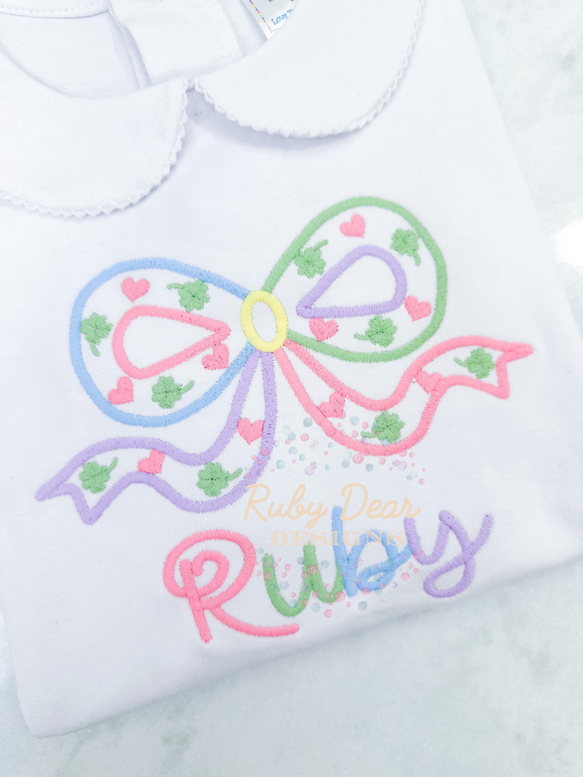 St Patrick's Rainbow Bow Satin Outline Machine Embroidery Design